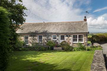 Pretty Corlan Cottage is located in the heart of the village.