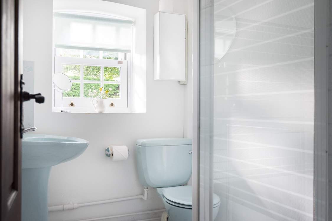 The shower-room is next to bedroom 1.