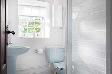 The shower-room is next to the twin bedroom.