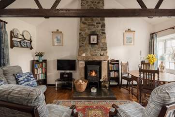This cute and compact cottage retains many original features.