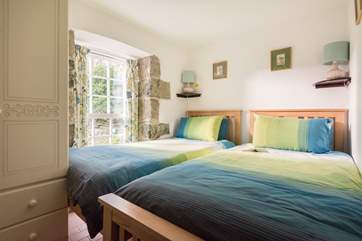 Bedroom 2 can be a pretty single room or a snug twin room.