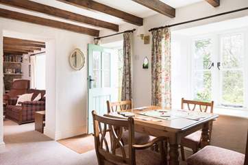 The front door of the cottage opens into the snug, a quiet room, ideal if you have to work whilst on holiday.