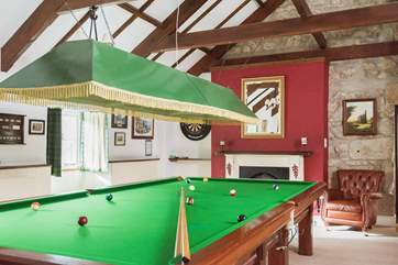 The fabulous games-room has a full-sized snooker table.