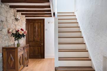 The inner hall with staircase rising to the bedrooms and family bathroom.