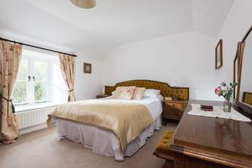 The master bedroom with king-size double bed (Bedroom 1).