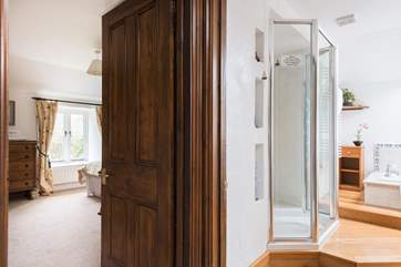 Looking across the landing to the master bedroom and the family bathroom.