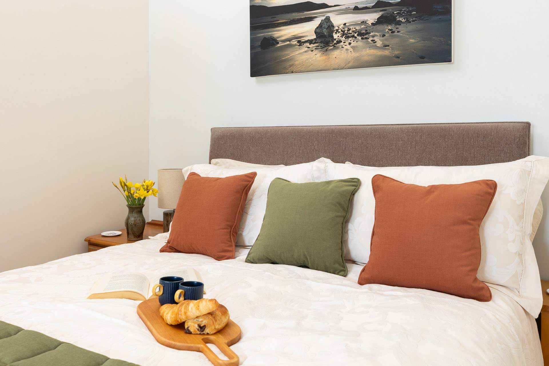 The tastefully furnished bedroom.