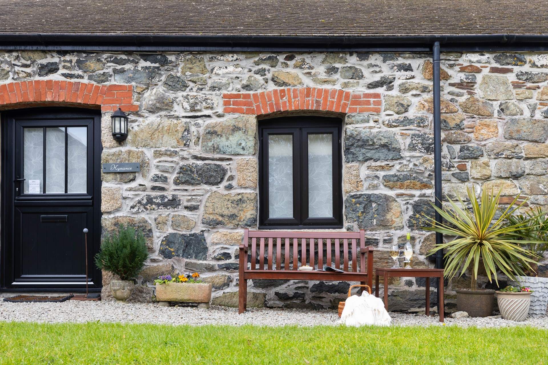 The stonework is crafted from local serpentine.