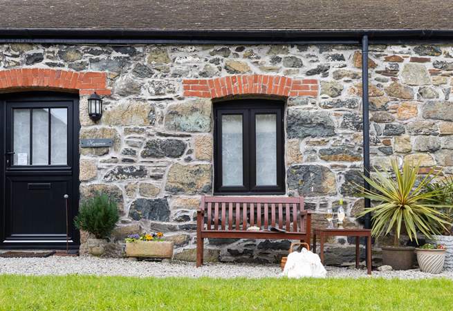 The stonework is crafted from local serpentine.