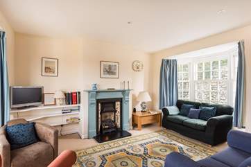 The dual-aspect sitting-room is very light and welcoming.