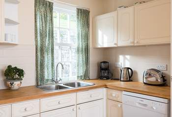 The kitchen-area is light and bright and fully equipped.