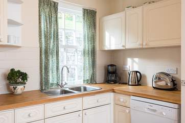 The kitchen-area is light and bright and fully equipped.