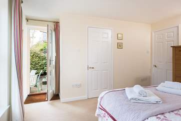 The double bedroom has a door out to the terrace (Bedroom 1).