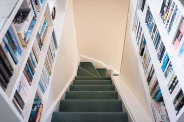 Steep stairs lead down from the first floor (please take care with children).