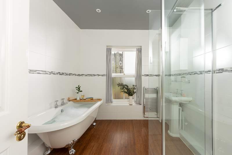 The family bathroom on the lower ground floor has a fabulous free standing bath and separate shower.