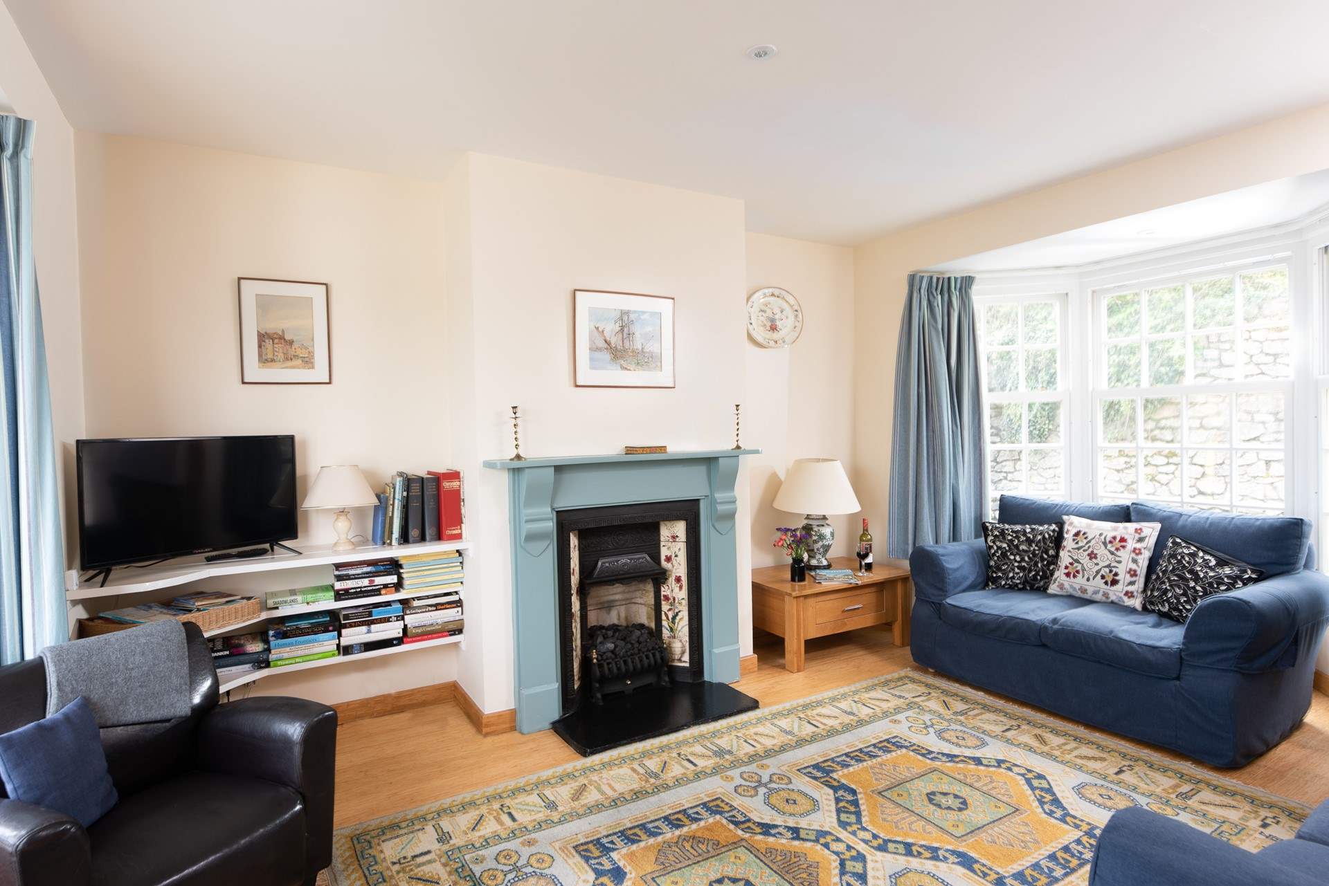 The dual-aspect sitting-room is light and welcoming.