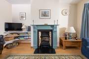 The coal-effect fire will keep you cosy in cooler months.