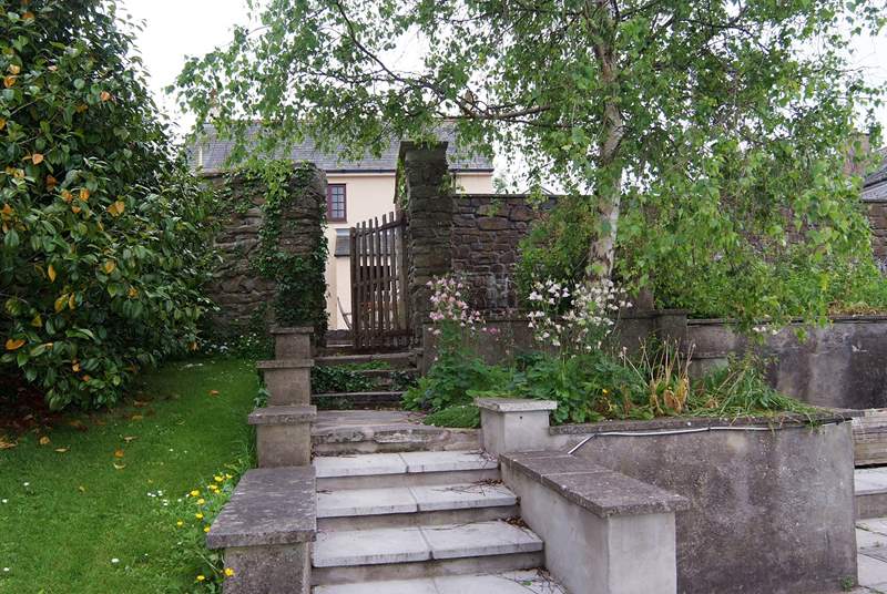 The steps from the pool up to the cottage. The gate is at the top.