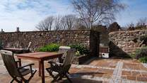 The private patio is sun-drenched.