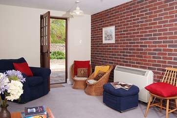 ......and has a door right out onto the fully enclosed, private patio.