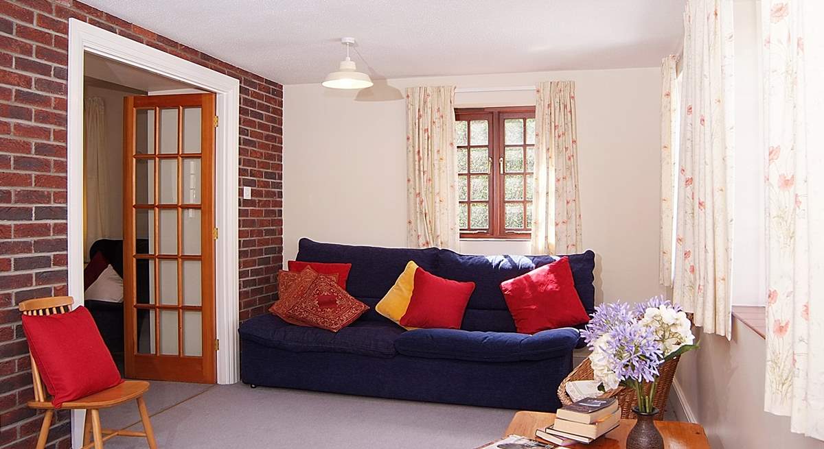 The second sitting-room is spacious and ideal for children to play in......