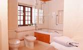 There is a really large family bathroom with bath and shower. - Thumbnail Image