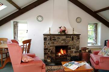 The open fire in the sitting-area.