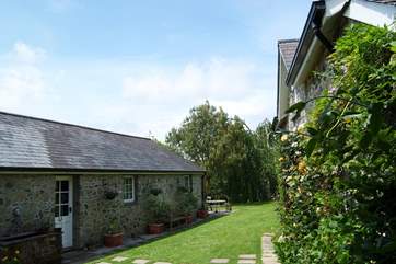 The outside of the games-room opposite the cottage.