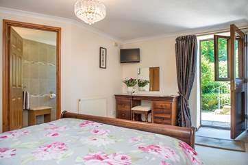 From the bedroom you can step straight out onto the patio
