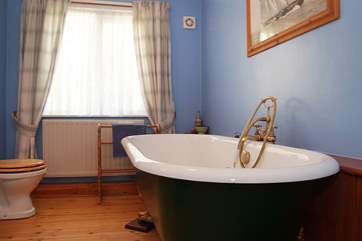 The big claw-foot bath in the bathroom.