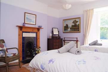 A lovely original fireplace in Bedroom 2.