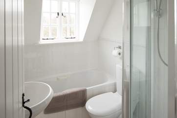 The second floor bathroom has a three-quarter size bath and shower cubicle.