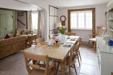 The sociable dining-area with a lovely farmhouse table and a dresser containing plenty of holiday games.