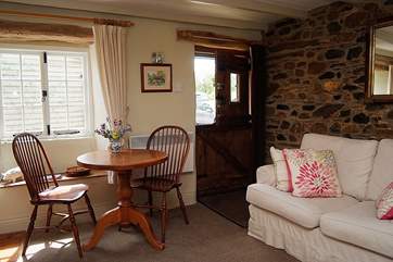 A stable-door opens into this lovely cottage.