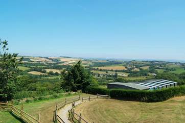 From the upstairs bedroom window you can also see the path leading from the garden down to the pool enclosure.