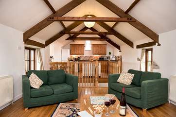 The open plan living-room will ensure you have a very sociable holiday.
