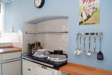 There are plenty of pots, pans and cooking equipment.