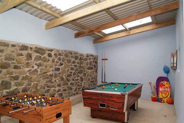 The games-room includes an air hockey table, table-football, a pool table and a dart board.