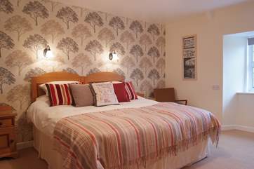 The stunning master bedroom has a super king size bed (6') and en-suite shower room (Bedroom 3).