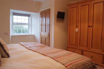 There is plenty of storage space in the bedrooms.
