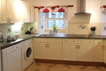 The well-equipped kitchen is just off the dining-room.