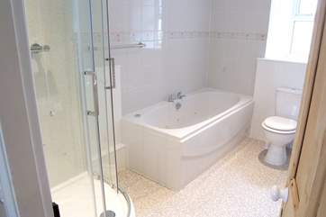 The ground floor family bathroom is close to the sitting-room and ground floor bedroom.