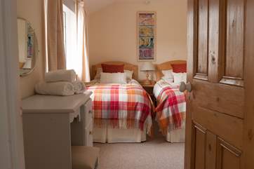 The twin bedroom is on the half landing and overlooks the farm courtyard (Bedroom2).