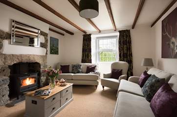 The sitting-room has plenty of space for everyone.