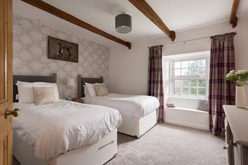 The twin bedroom is quietly tucked away at the end of the house (Bedroom 4).