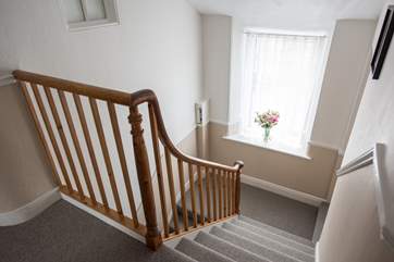 The wide staircase in this lovely house.