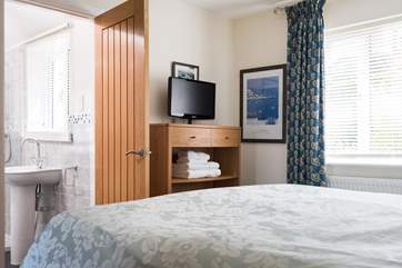 Bedroom 1 has an en suite shower-room.