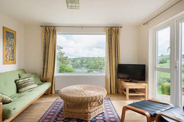 Bedroom 5 has glorious views from its big picture window and patio doors to the terrace. This room now has 2 comfy chairs rather than the futon.