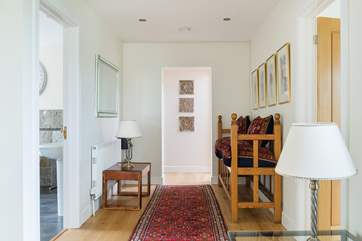 The hallway at one end of the house with Bedrooms 3, 4 and 5 and the bathroom.
