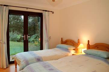 Bedroom 2 has twin 3' single beds.